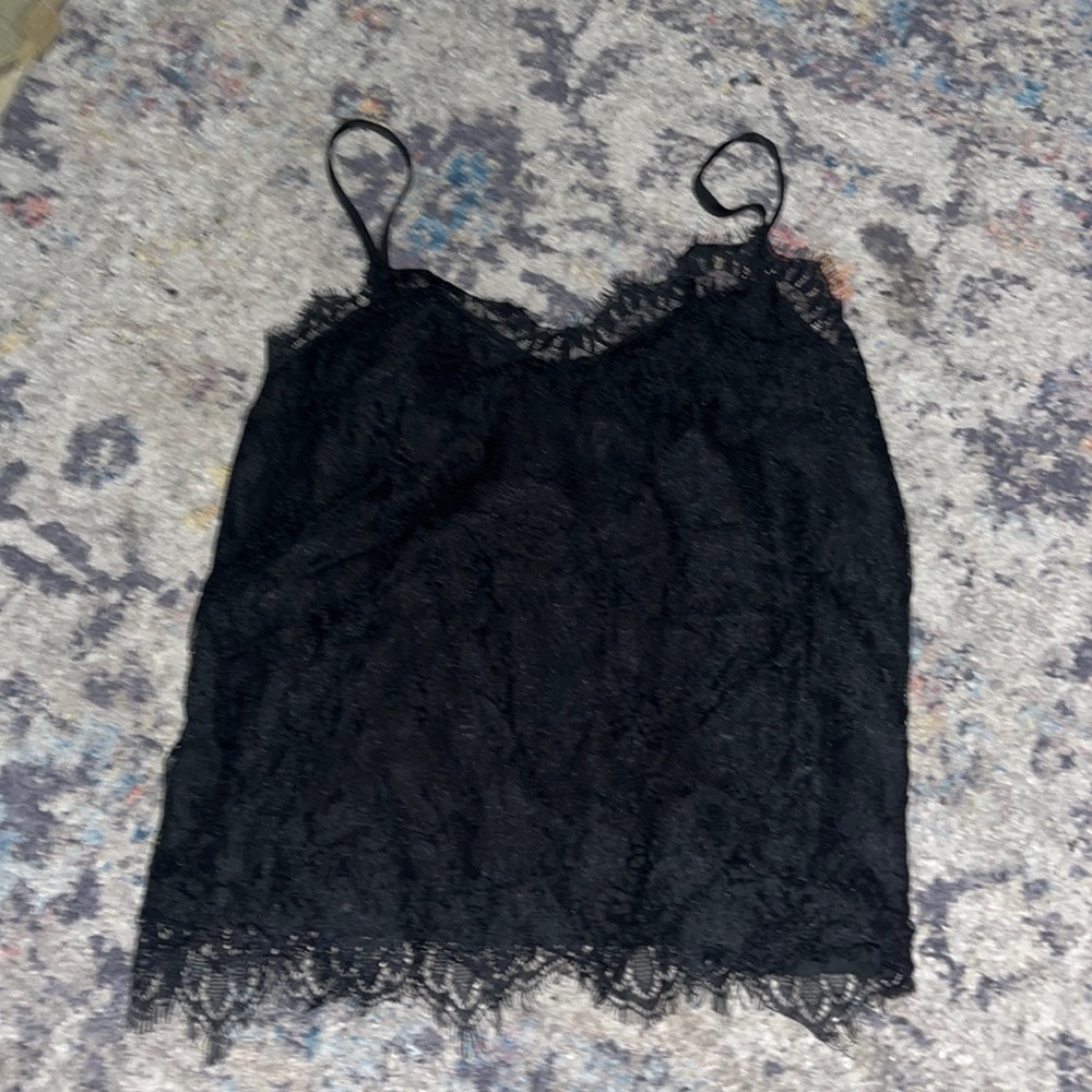 Lace all black top with spaghetti straps size xs, still as new just wanna sell